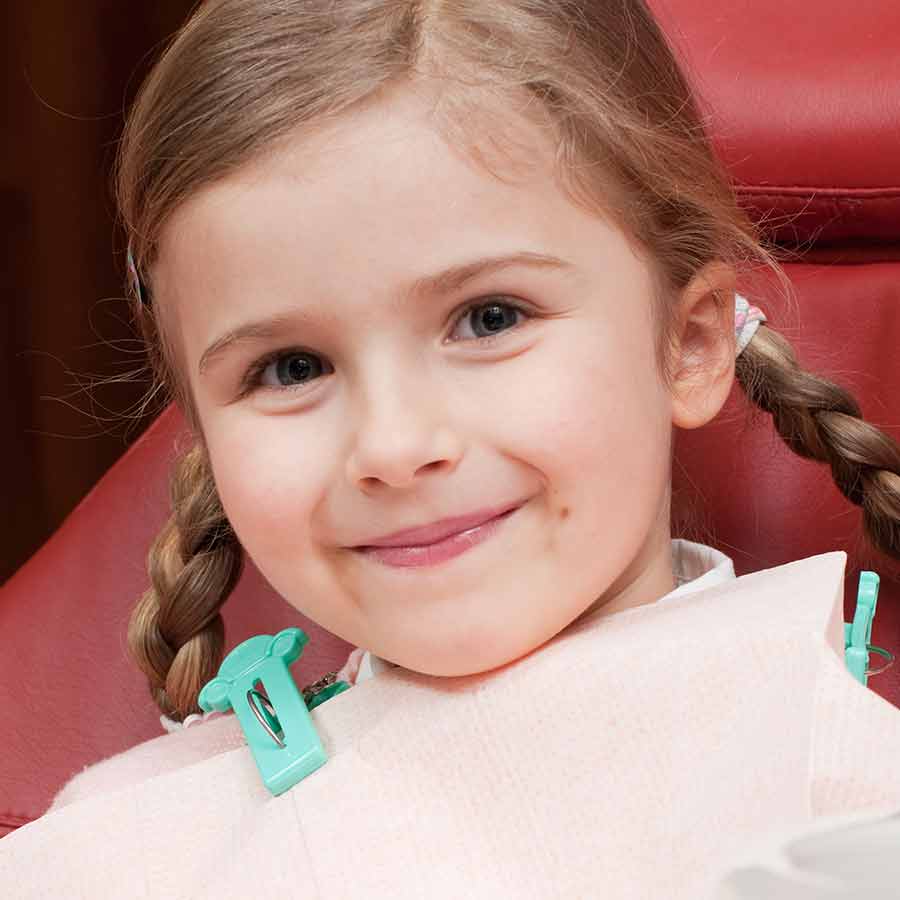 Child in dental chair.